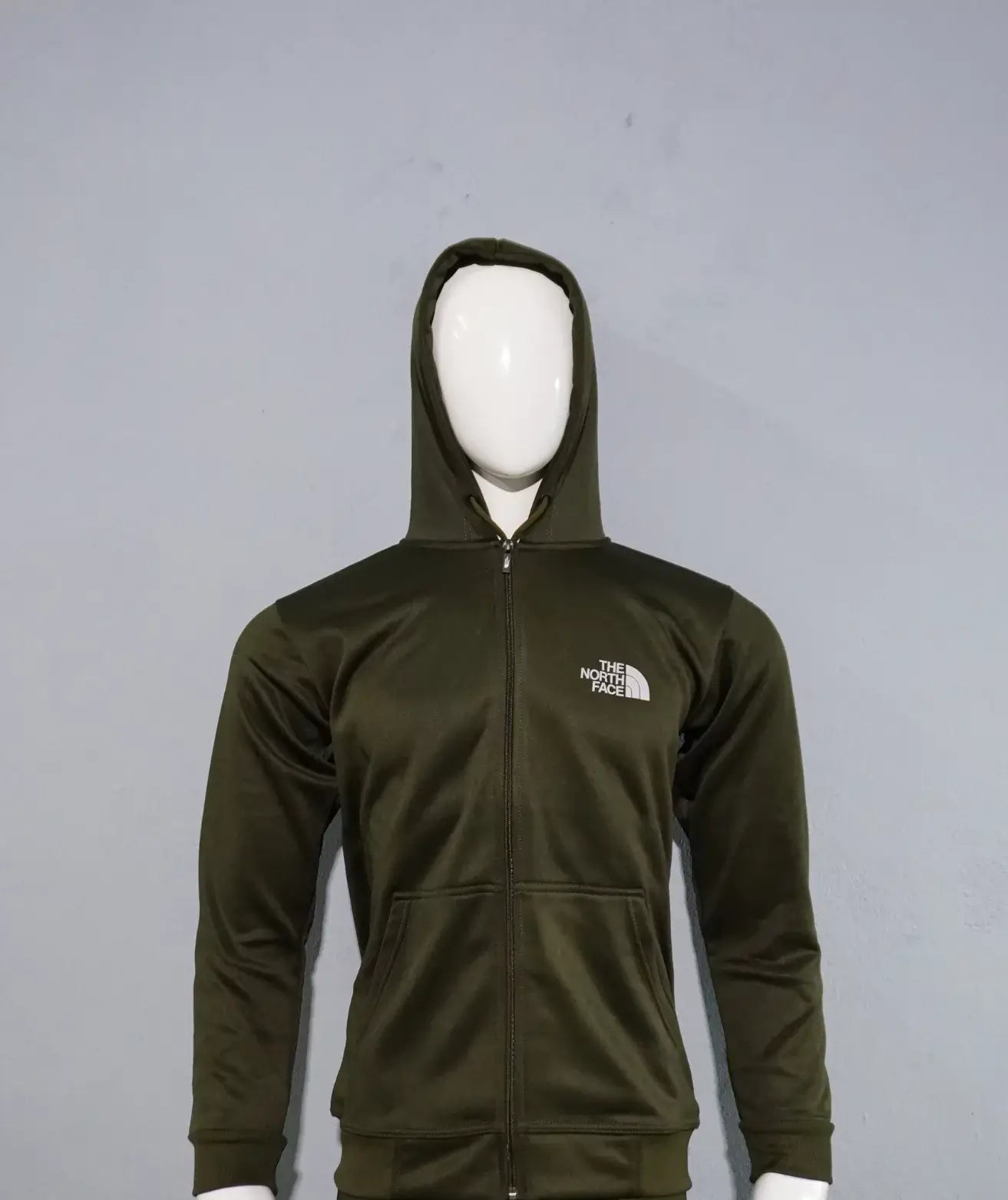 Green north face tracksuit on sale